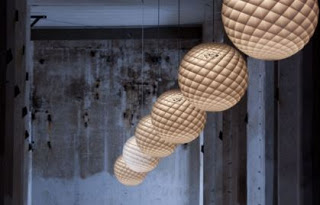 Patera – Louis Poulsen  The pendant is a glowing sphere built up of small diamond-shaped cells. Each cell is carefully designed to capture light and to shield the light source from the viewing angles above 45 degrees. 